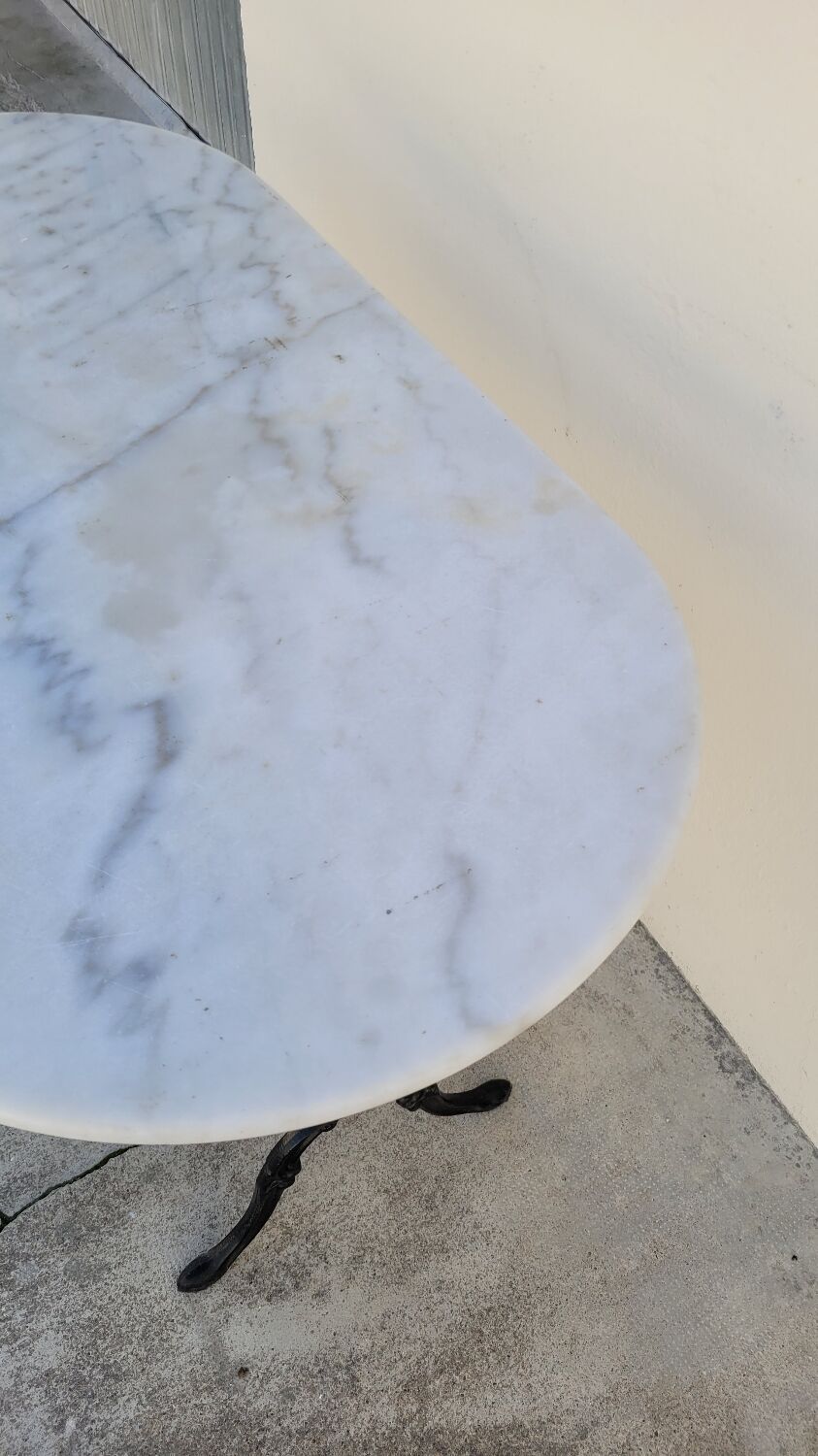 Cast iron bistro table and old oval marble top