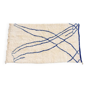 Beni Ouarain rug in white and blue.