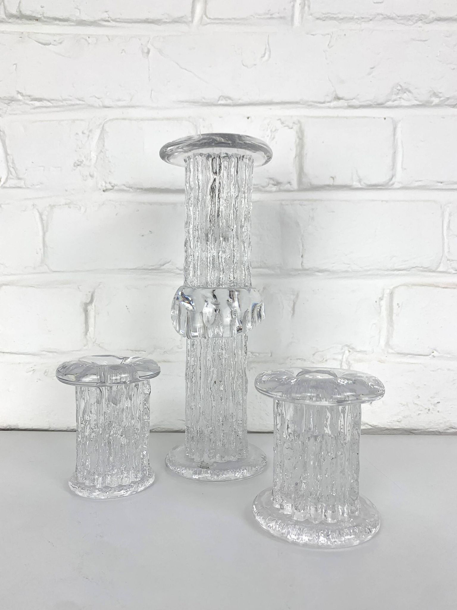 Glass candle holders by Göran Wärff for Kosta Boda, Sweden, 1970s.