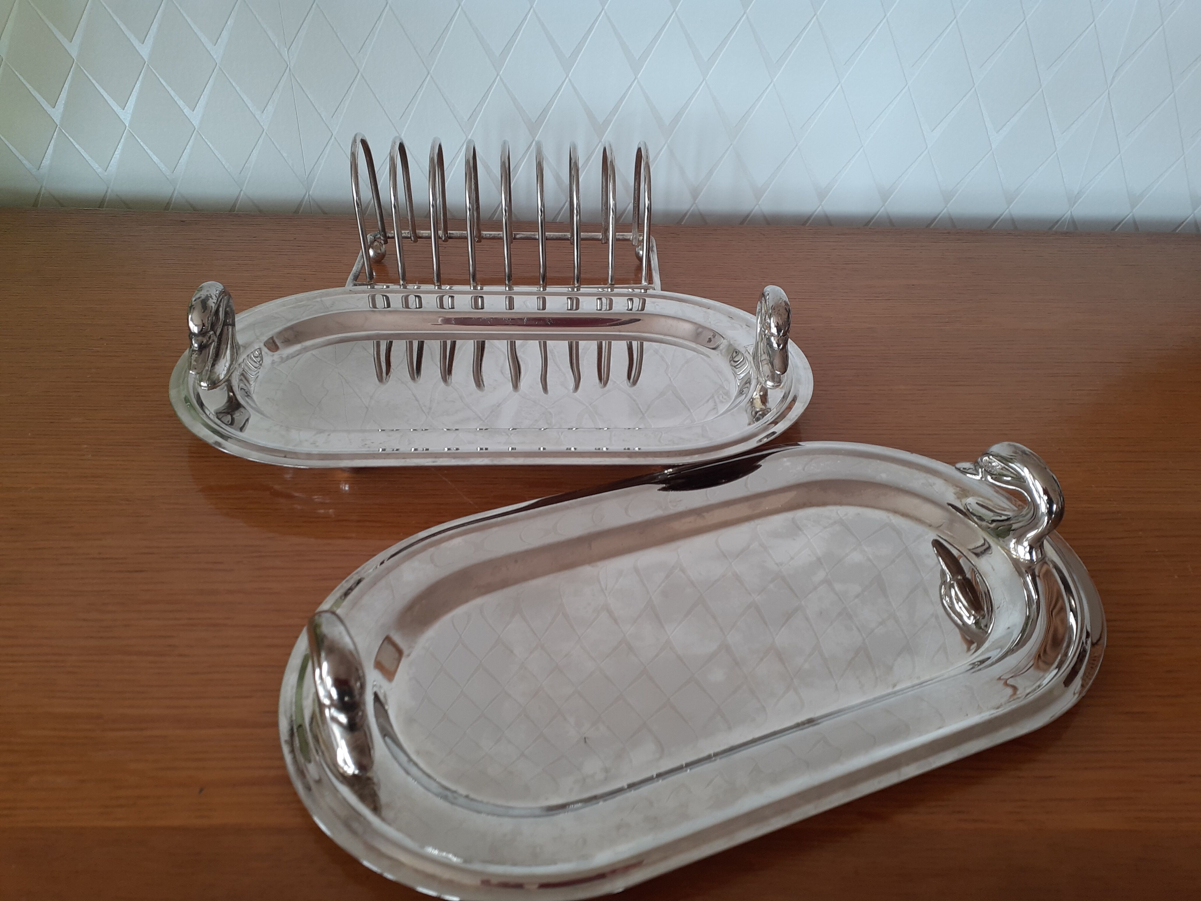Two foie gras dishes and their toast holder