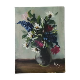 Still life with daisies and flowers in vase