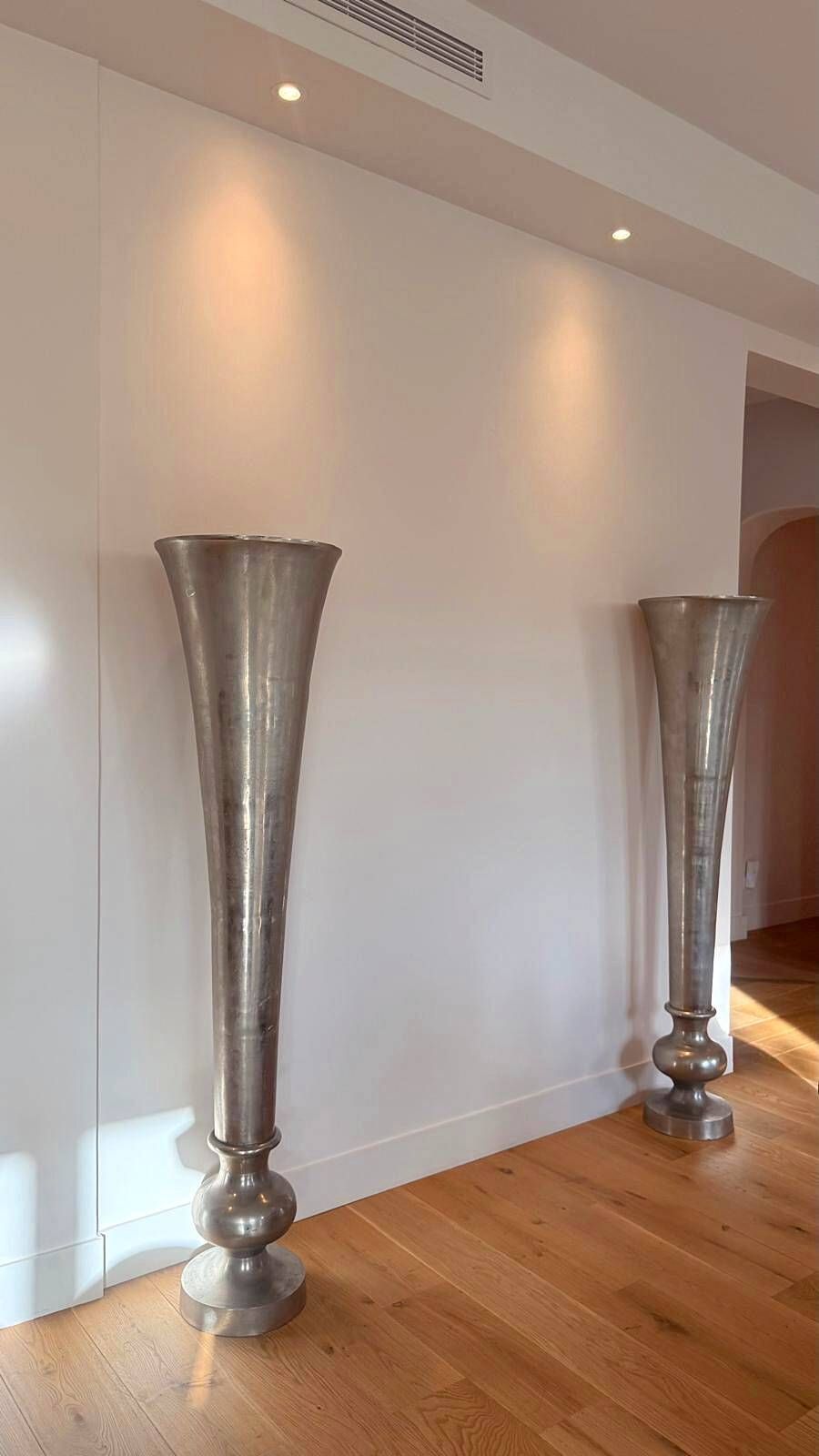 Pair of large silver-plated vases on a stand from Maison de la Literie, 165cm.