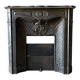 Ancienne cheminée en fonte de style Napoléon III – décor sculpté