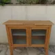 Art Deco sideboard in raw wood with a wax finish, closed by 2 glass doors.