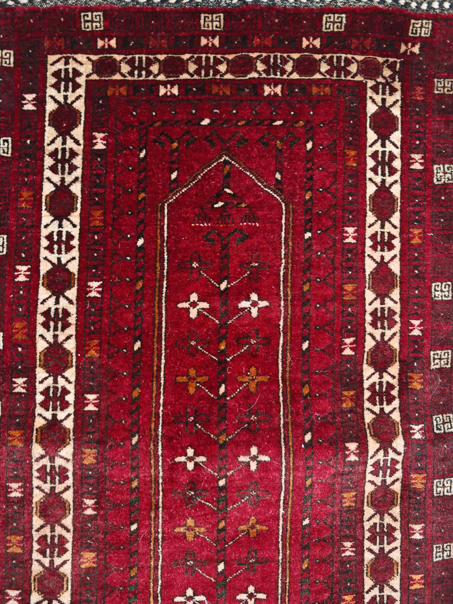 Vintage Afghan tribal prayer rug, hand-knotted from the 1950s.