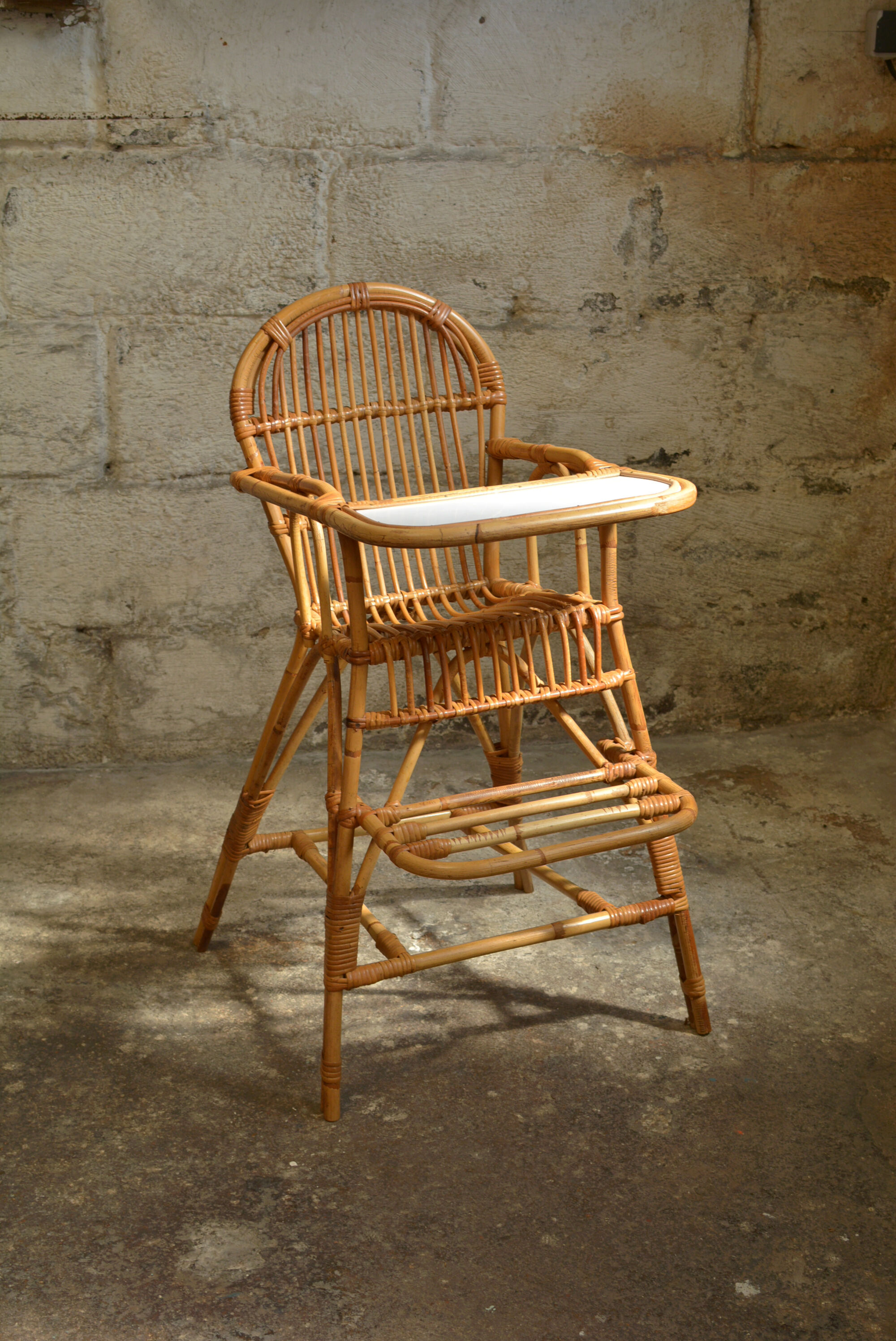 Vintage rattan high chair
