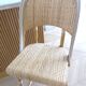 Lot of 3 Maison Louis Drucker light Manila rattan bistro high chairs.
