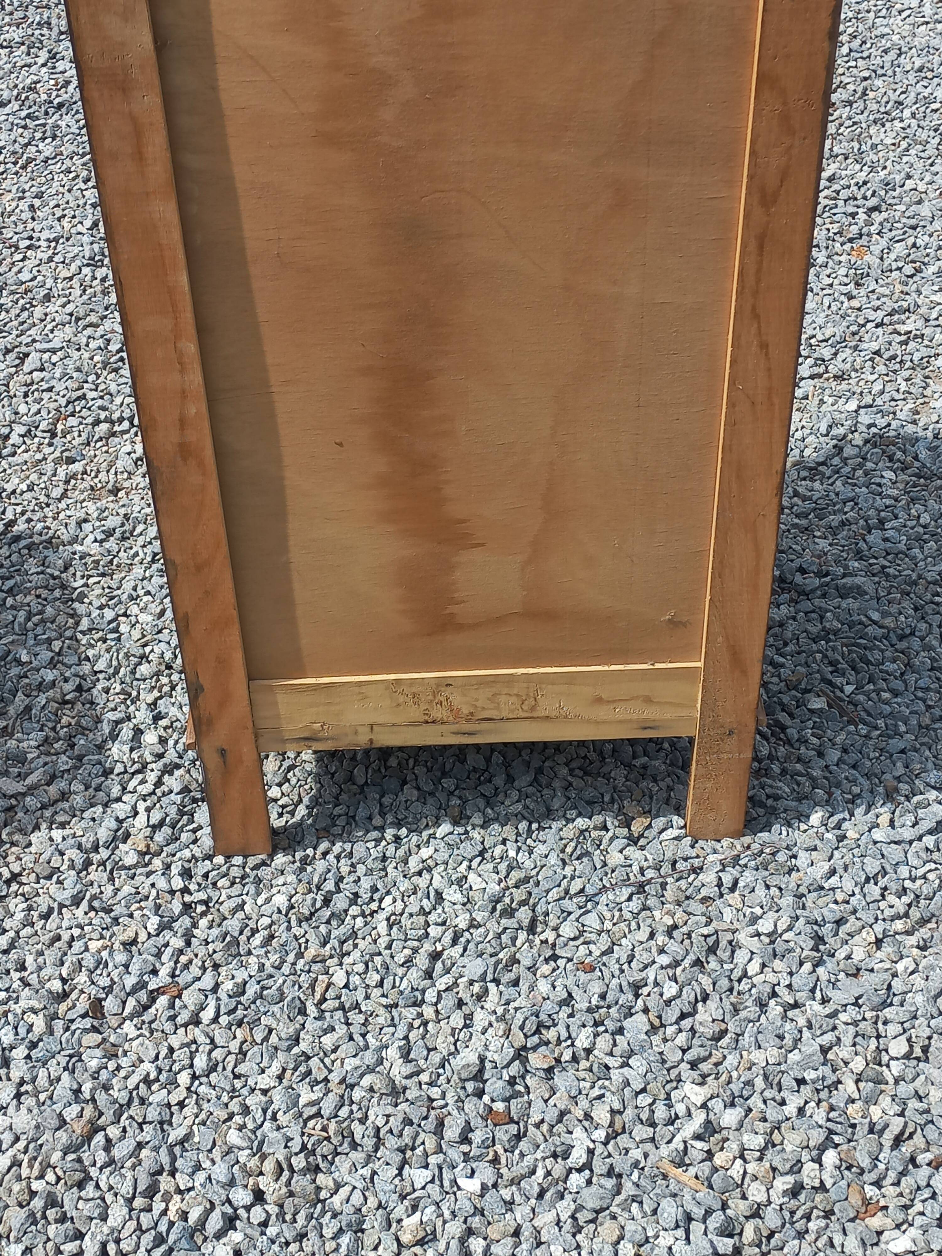 Vintage oak chest of drawers with tapered legs from the 1950s.