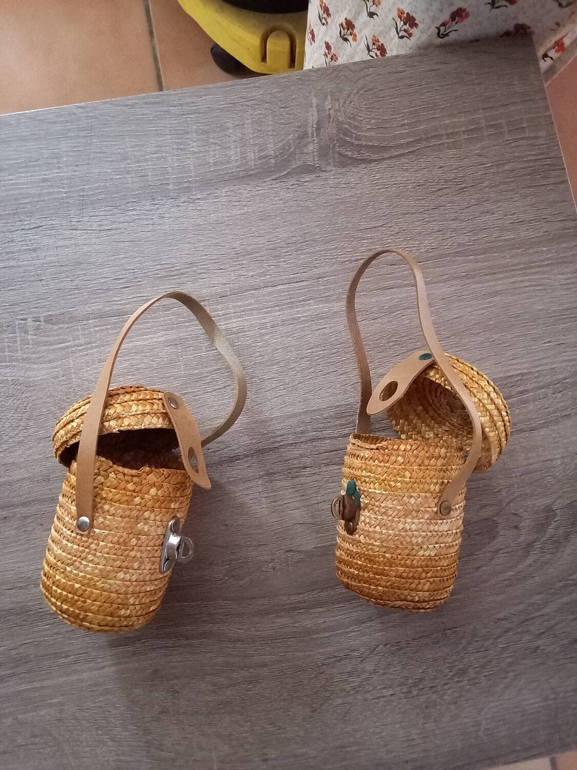 2 small rattan and leather baskets