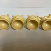 Quatre coquetiers rotatifs