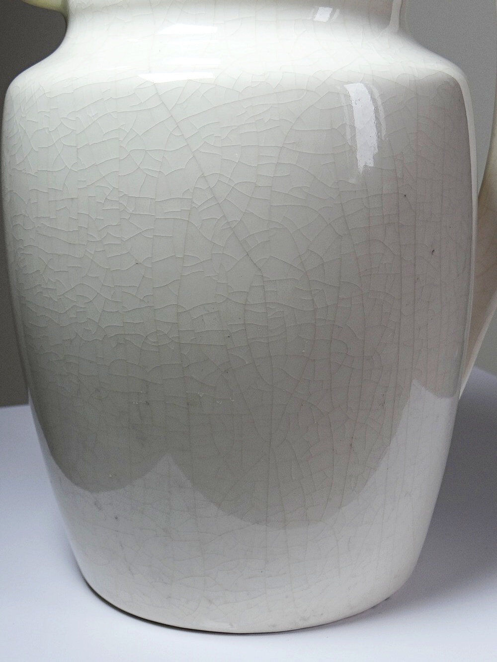 Large Art Deco toilet bowl, antique cracked faience.