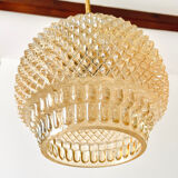 Suspension in iridescent molded glass