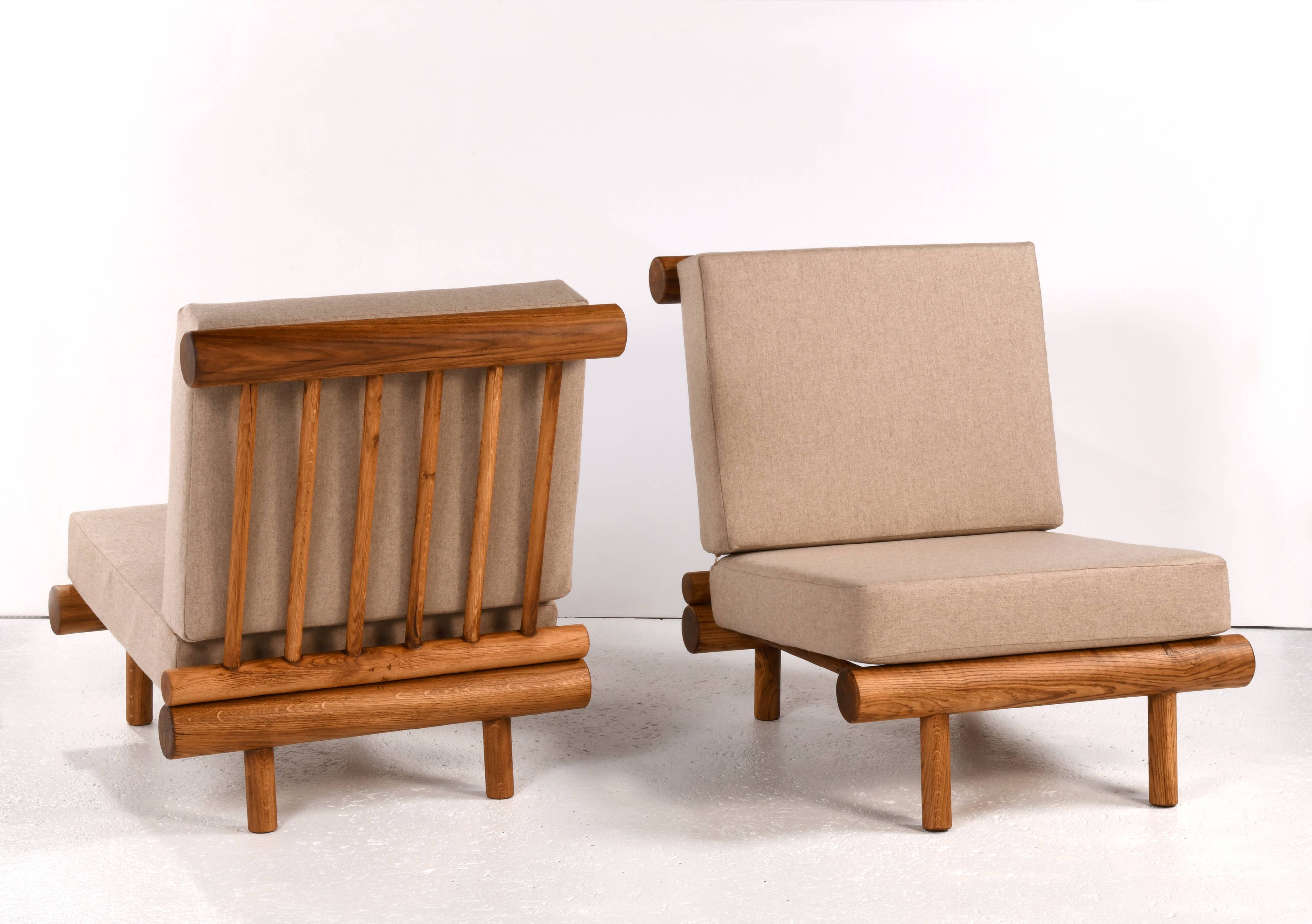 Pair of low chairs called La cachette selected by Charlotte Perriand