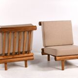 Pair of low chairs called La cachette selected by Charlotte Perriand