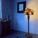Ornamental floor lamp with "flower" patterns from the 1970s.