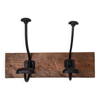 Old double cast iron and teak coat hook