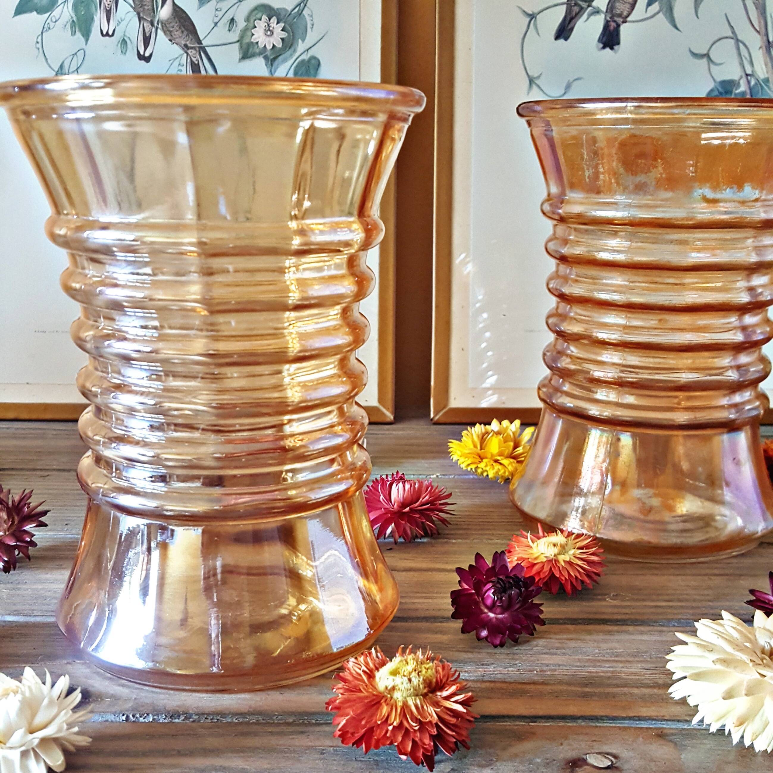 Pair of vintage orange-colored glass vases