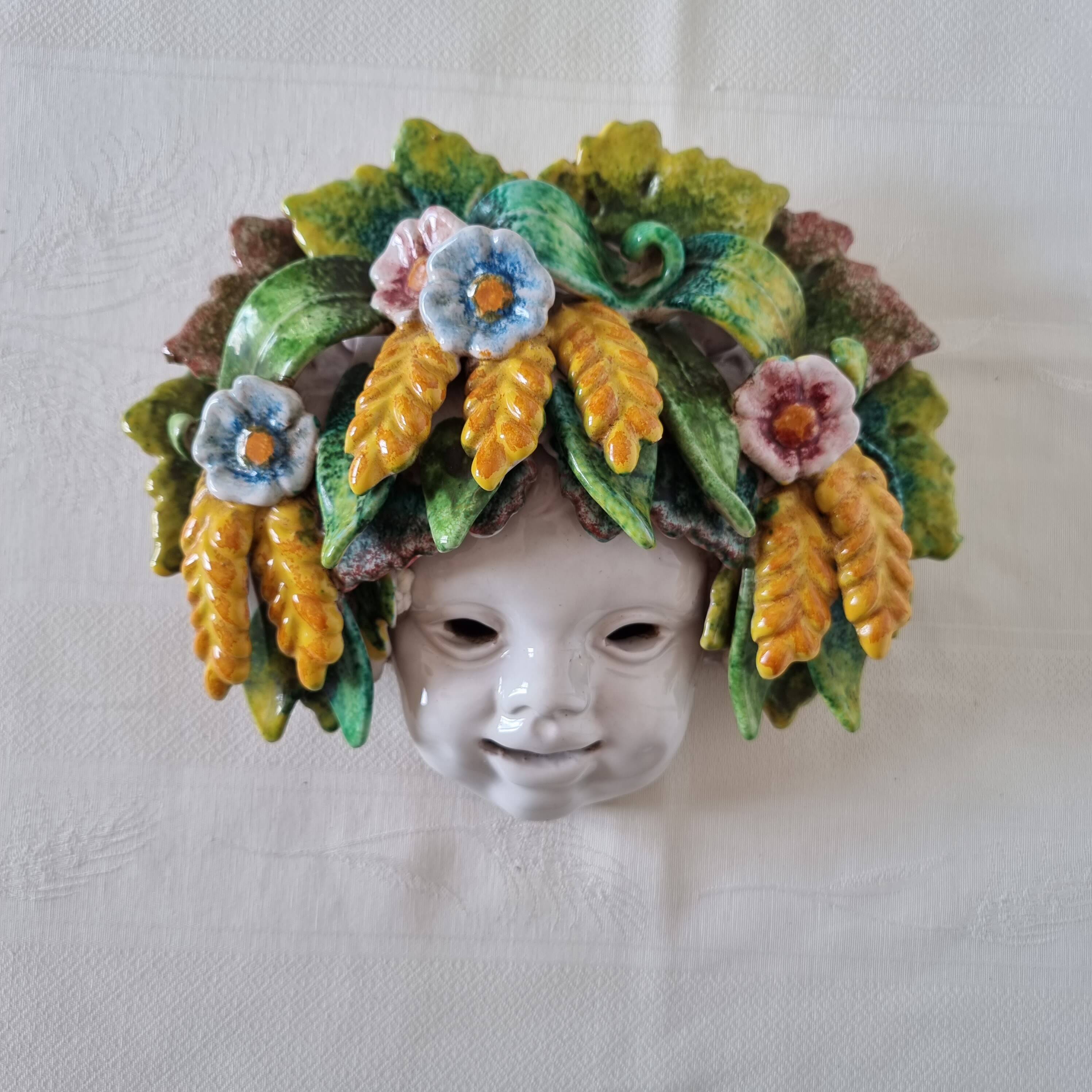 Vintage Italian ceramic wall mask, handmade, decorated with floral details