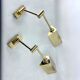 Postmodern pair of articulated brass wall lamps by Baulmann Leuchten. Germany 1980s