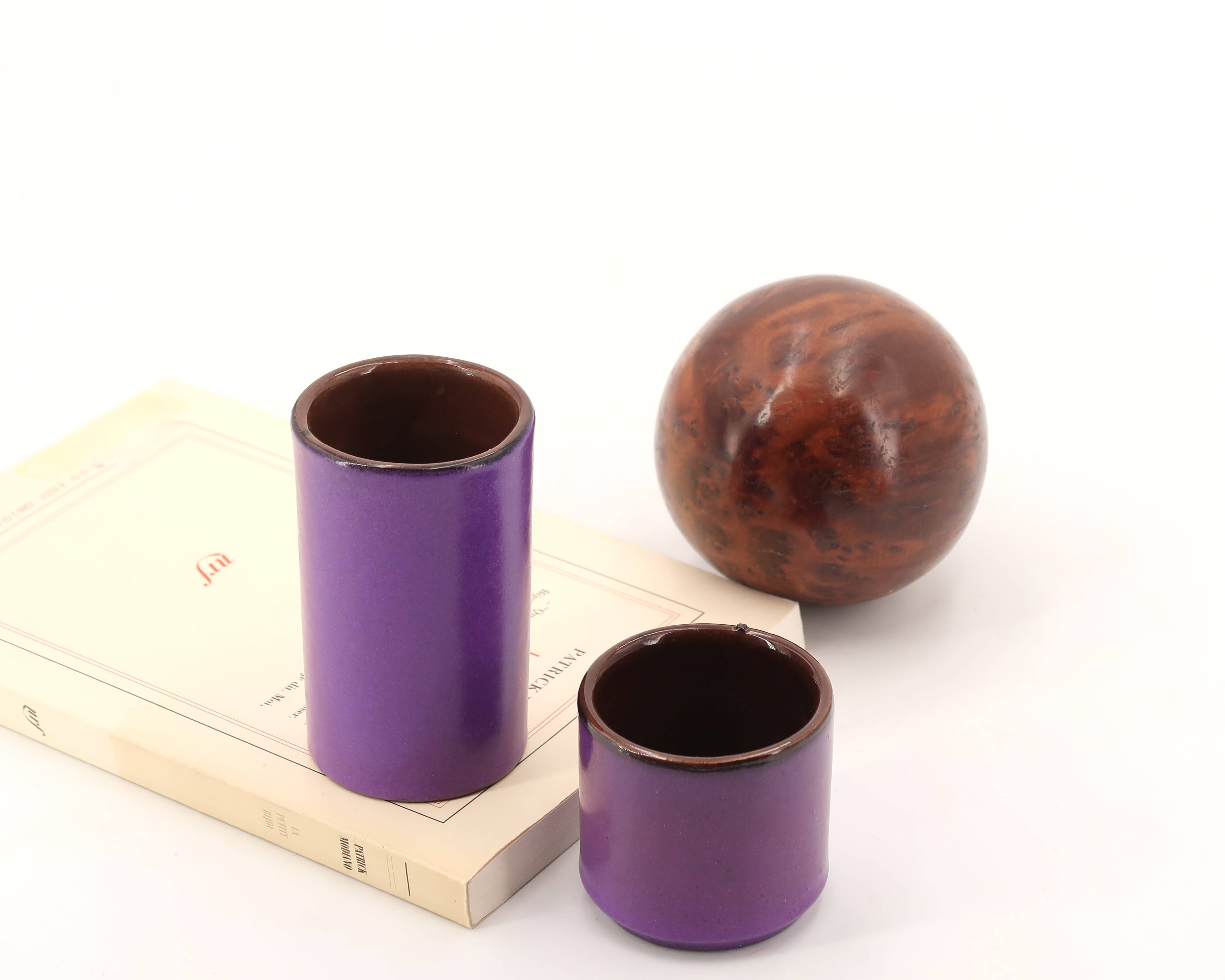 Two purple ceramic roller vases, 1970s