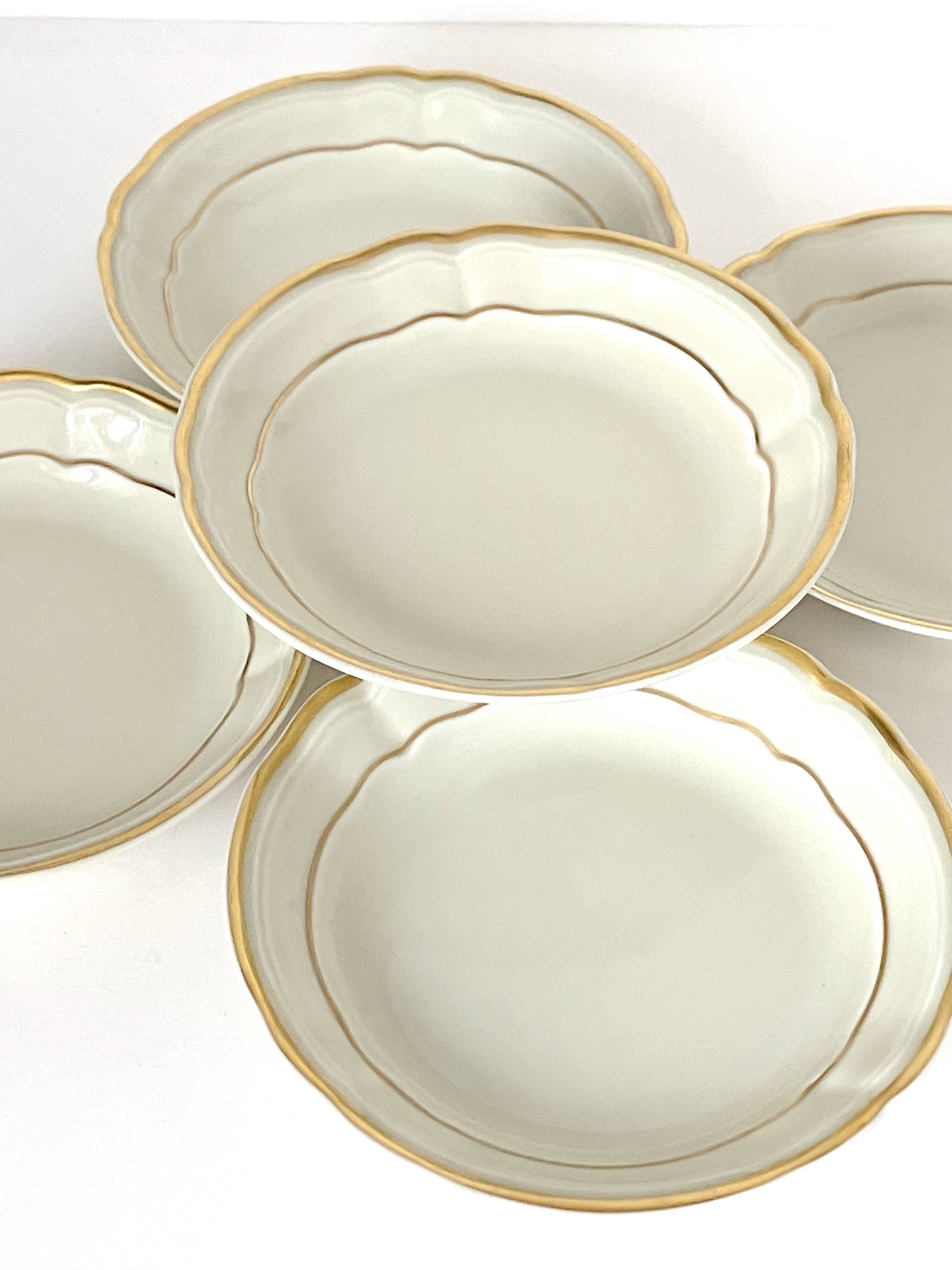 5 Bernardaud Limoges porcelain dessert bowls, Louis XV model, ivory with gold edging