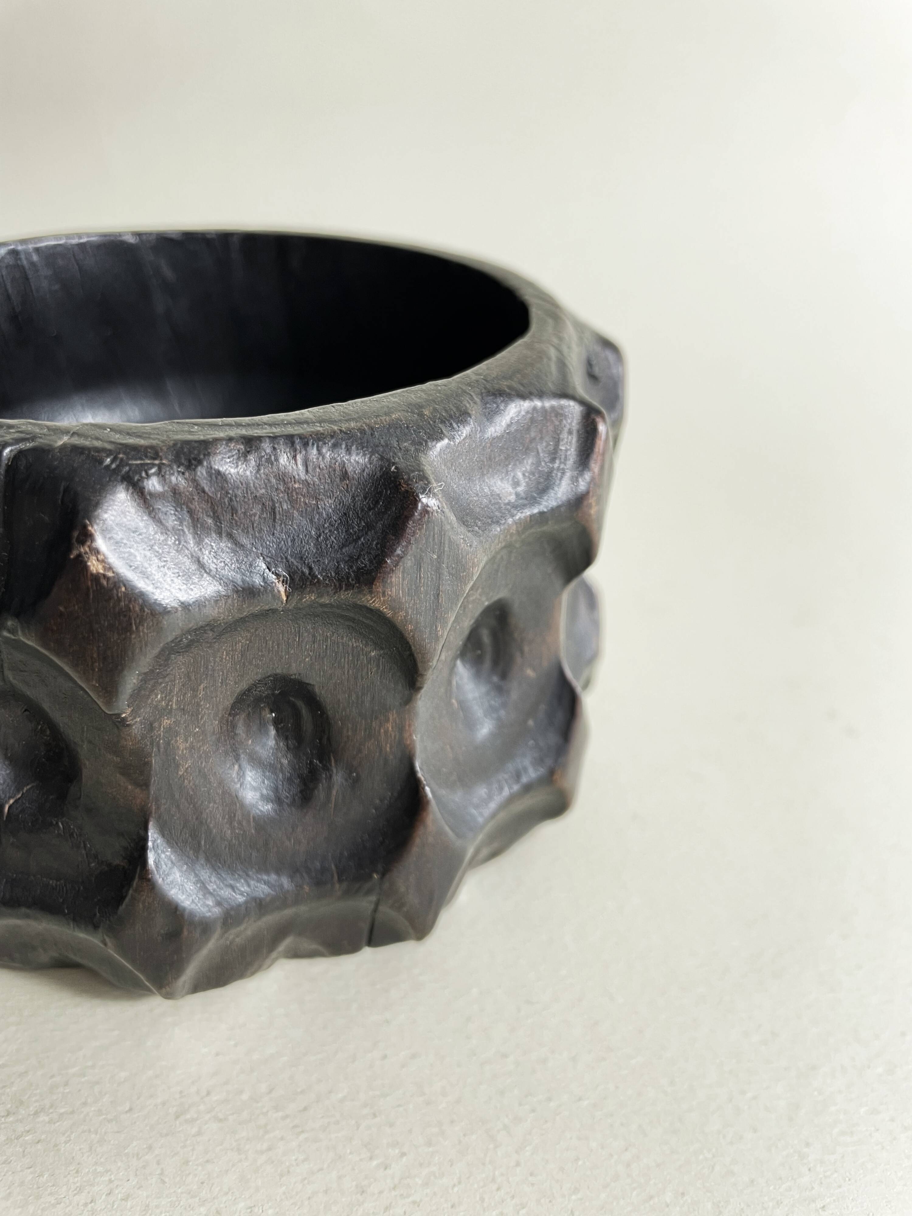 Brutalist wooden pocket emptier