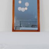Modern Swedish mirror in mahogany from the 1940s.