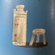 Old painted sheet metal jug or milk jug