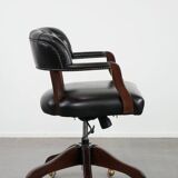 Adjustable black timeless Chesterfield office chair made of cow leather