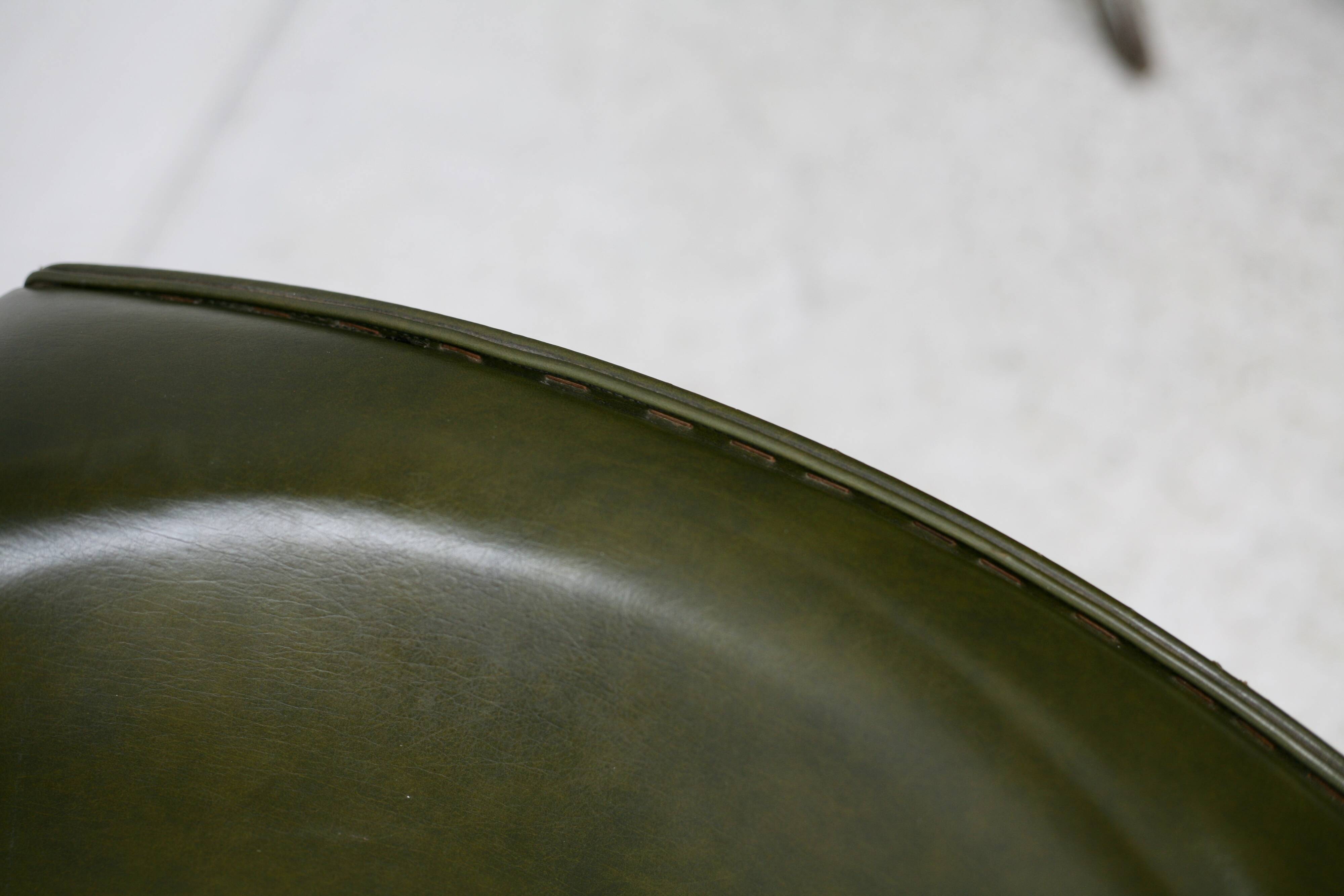 Pair of tubular armchairs, imitation leather. Circa 1950