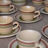 11 St Amand glazed stoneware cups and saucers/sugar bowl/milk jug