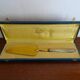 Antique silver and gilded metal pie shovel in case