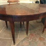 Solid oak table with 3 extension cords, 6 oak chairs with straw seat