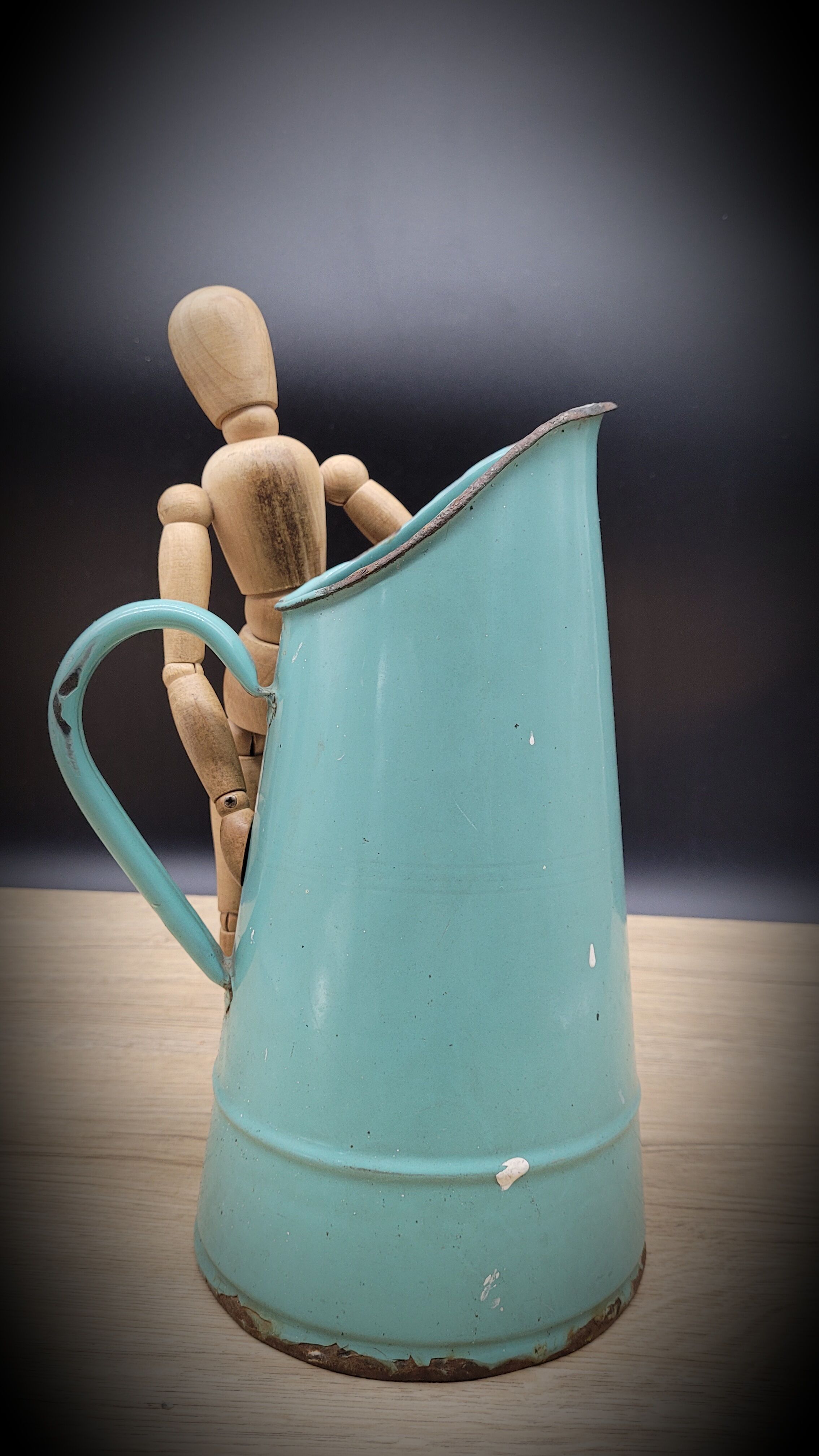 Green enamelled pitcher