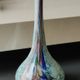 Ball vase soliflore with a long chimney neck. In speckled glass in the Murano style.
