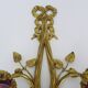 Paire d'Appliques murales en bronze à décor de noeuds à 2 bras à tulipe mauve Signées DP. Années 40
