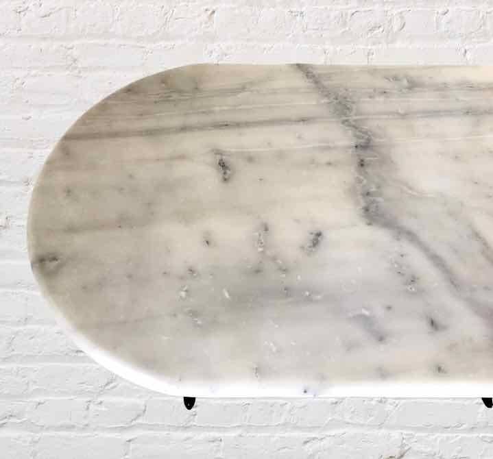 Oval marble and cast iron bistro table