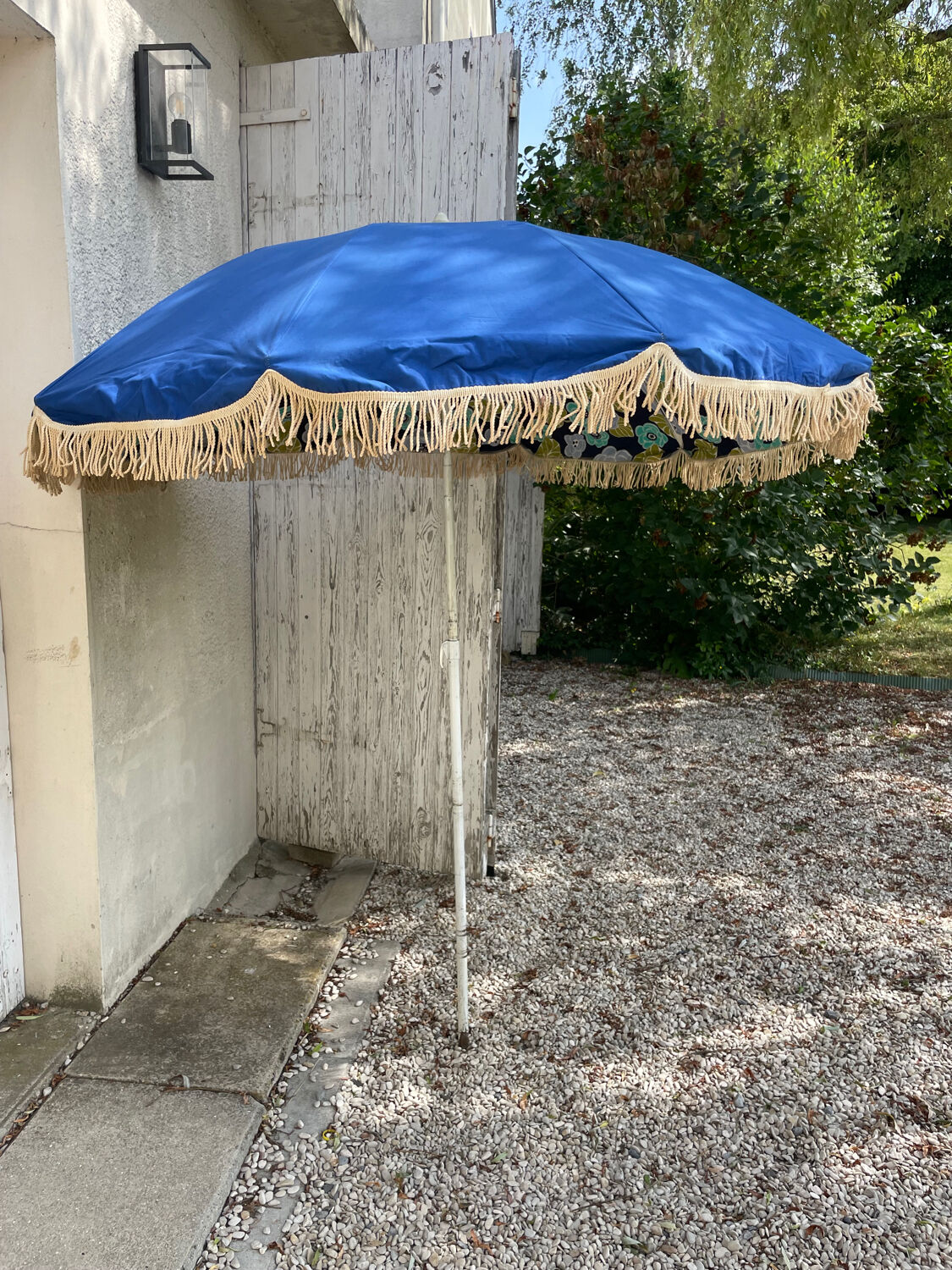 Blue parasol and flowers