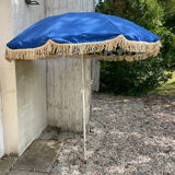 Blue parasol and flowers