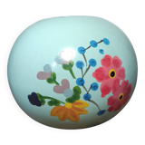 Floral candle holder in enamelled metal