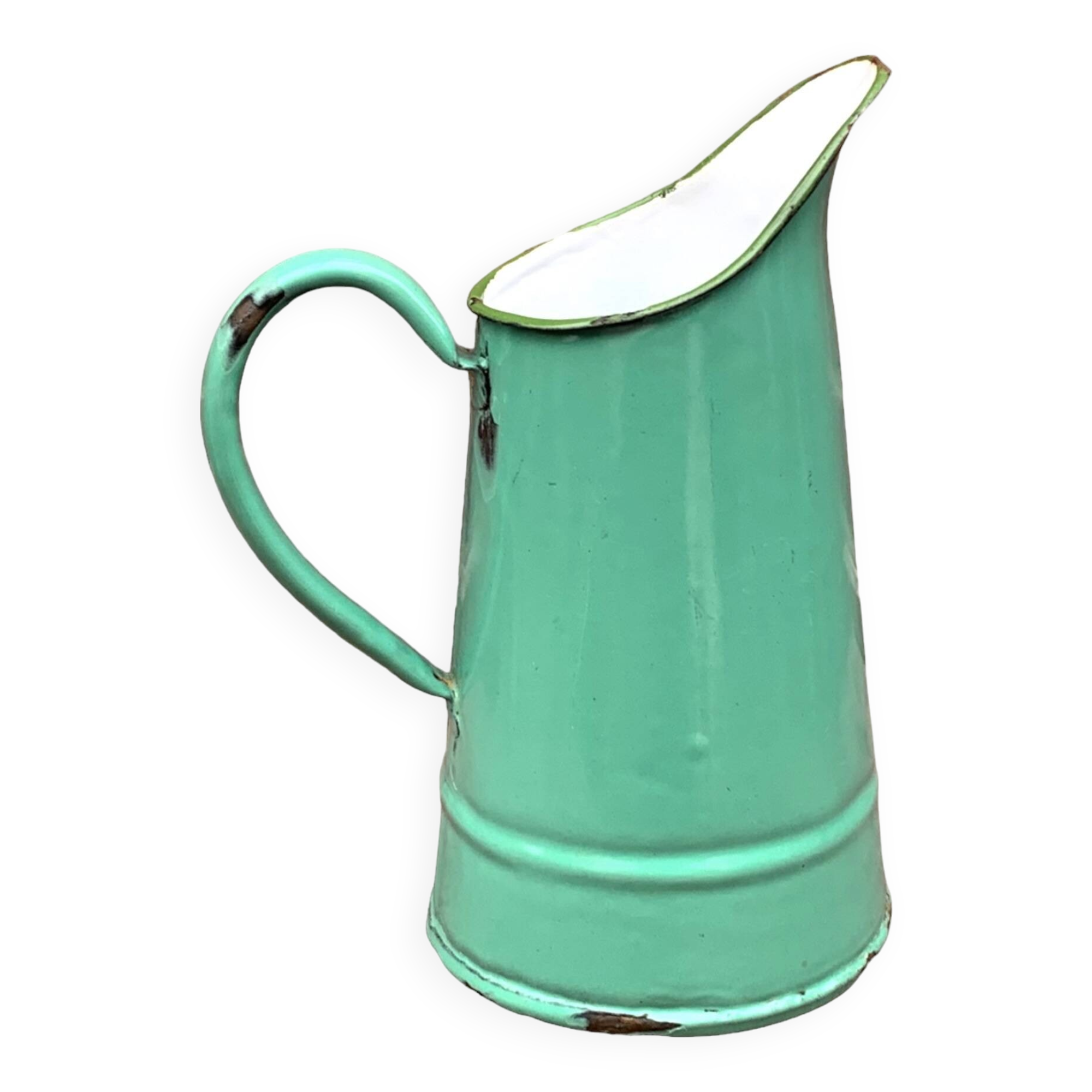 Vintage pitcher in green enameled sheet metal