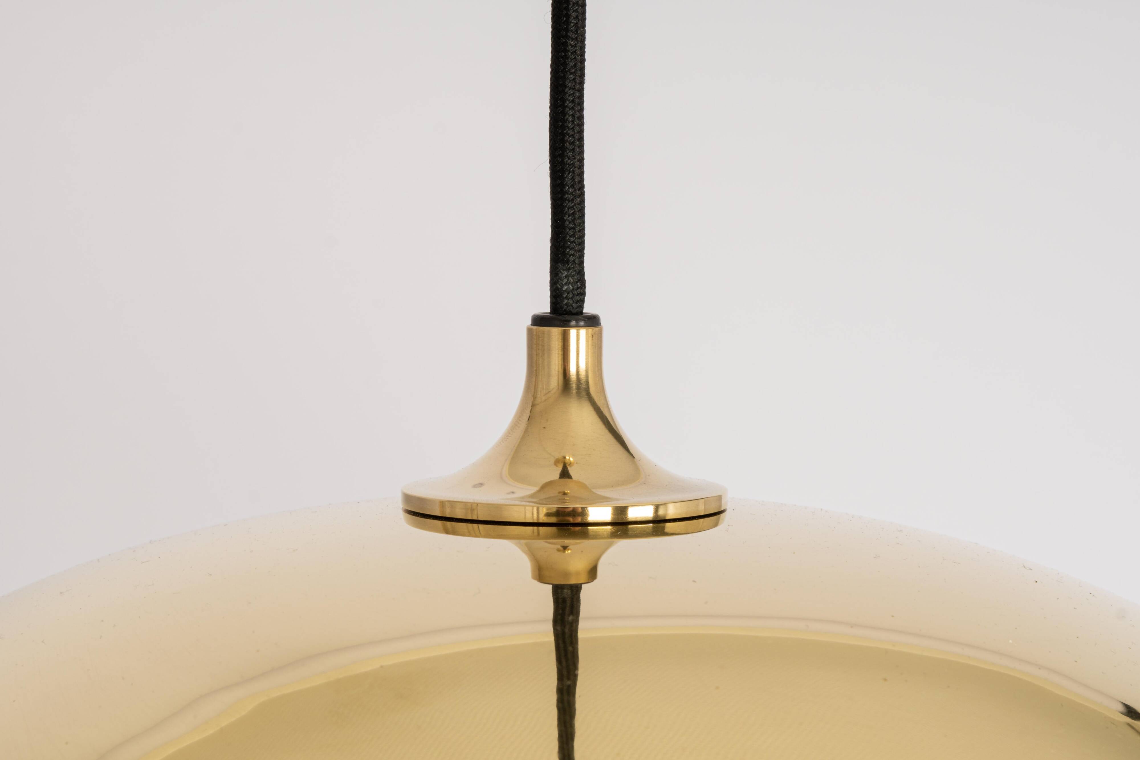 Large suspended brass chandelier by Florian Schulz, Germany.