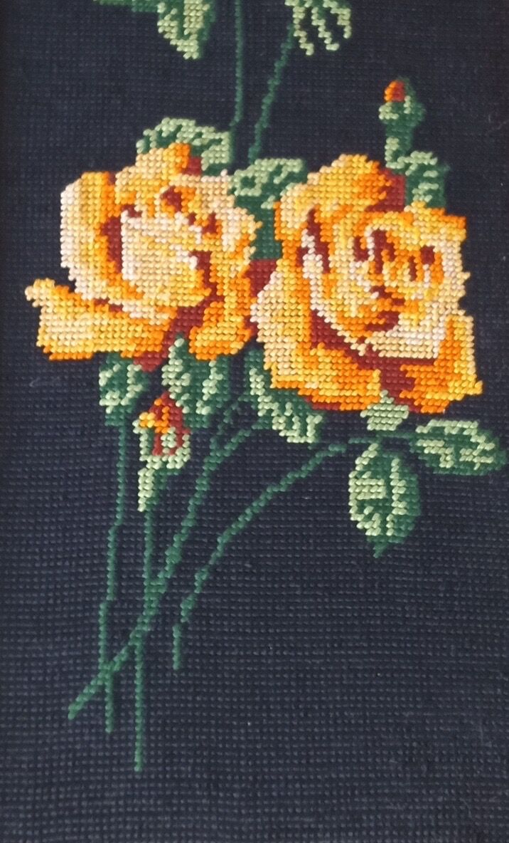 Golden frame with ancient canvas of yellow roses