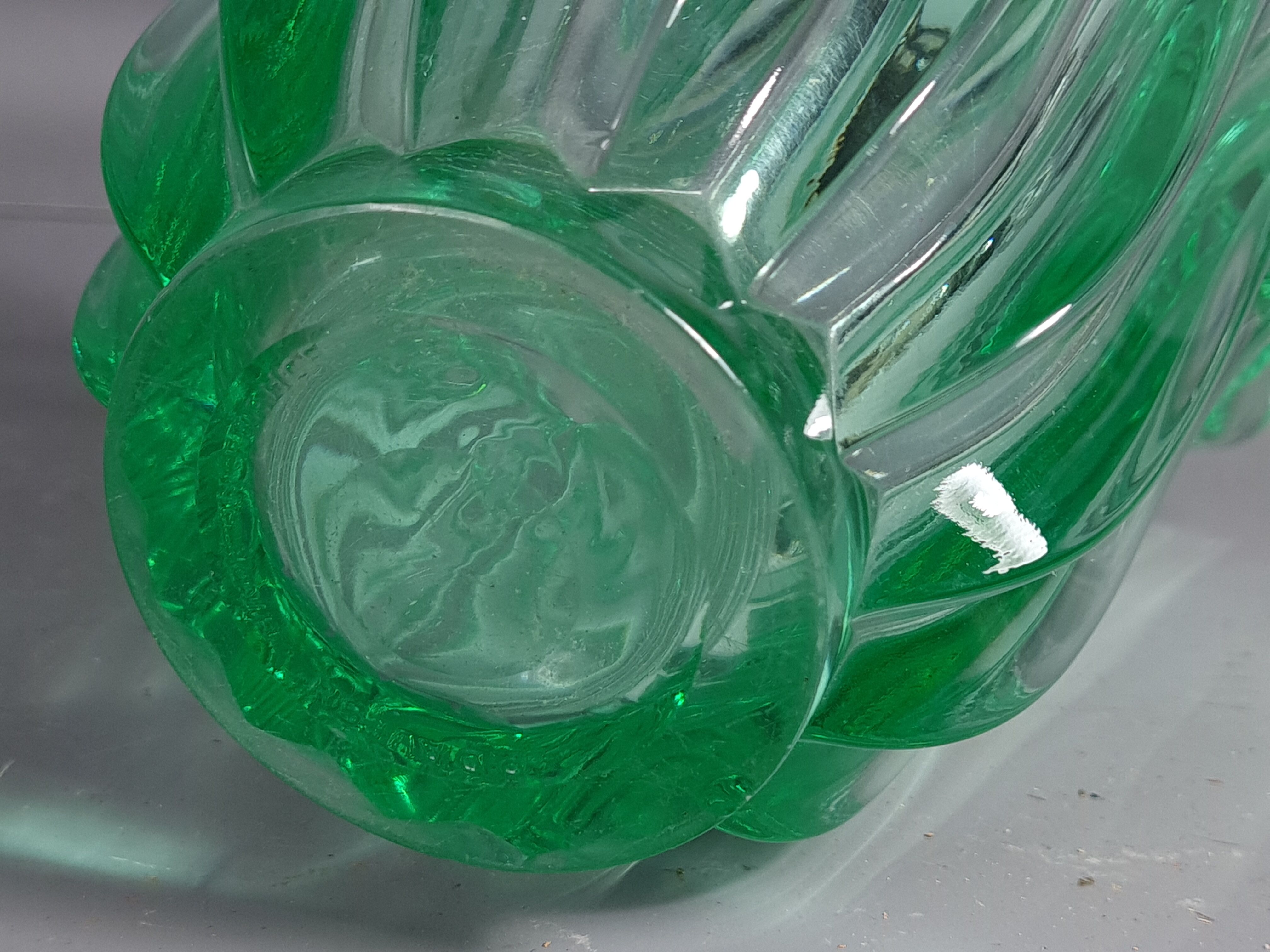 Molded pressed glass vase by Pierre D'Avesn around 1930. Signed