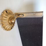 Wall shelf in glass and gold metal