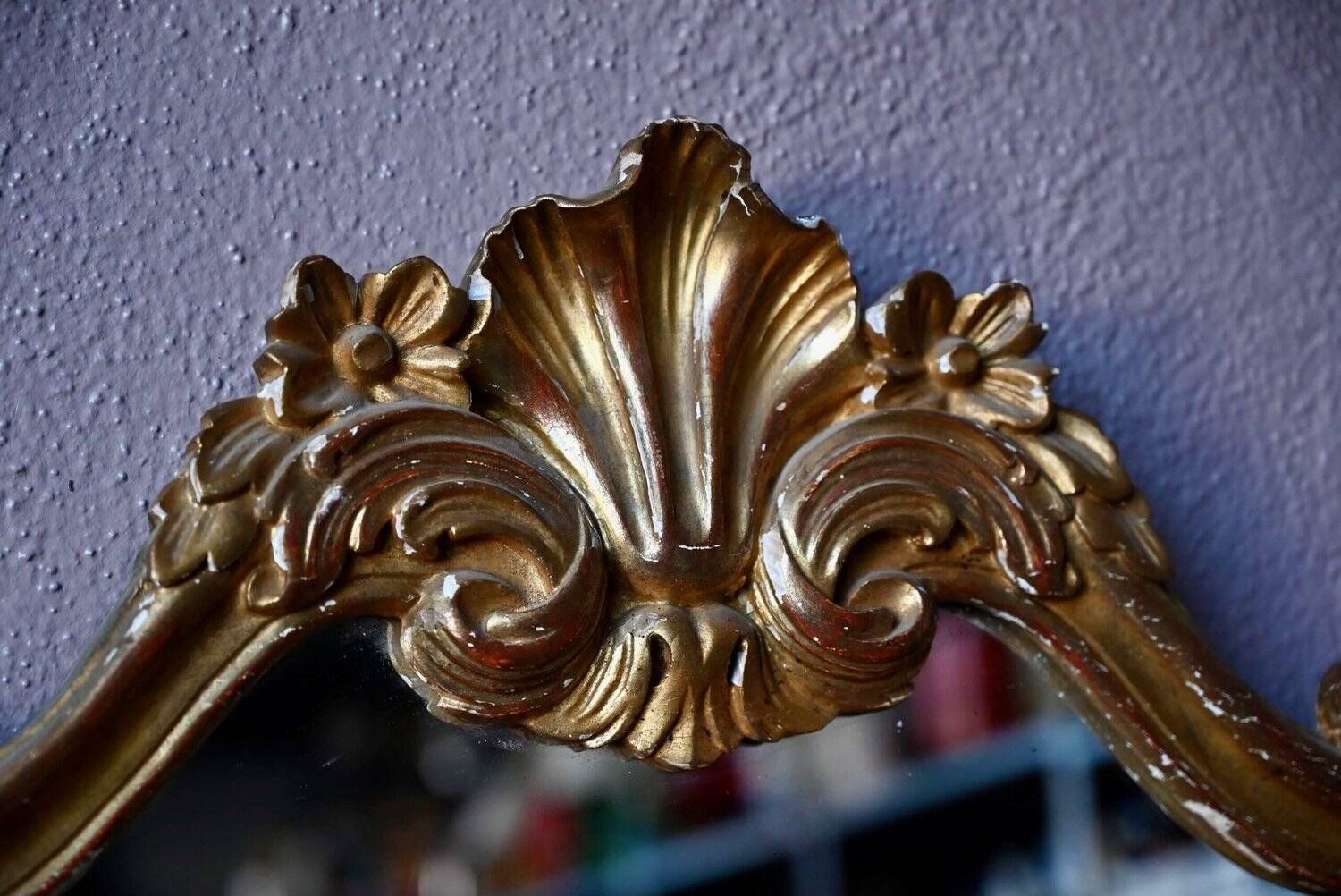 Baroque gold table mirror in Louis XV style, carved and stuccoed wood.