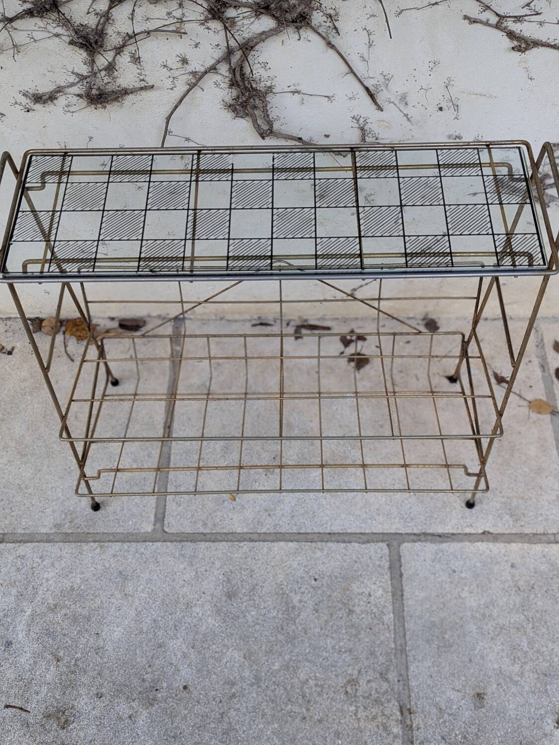 Gold metal magazine rack
