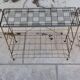 Gold metal magazine rack