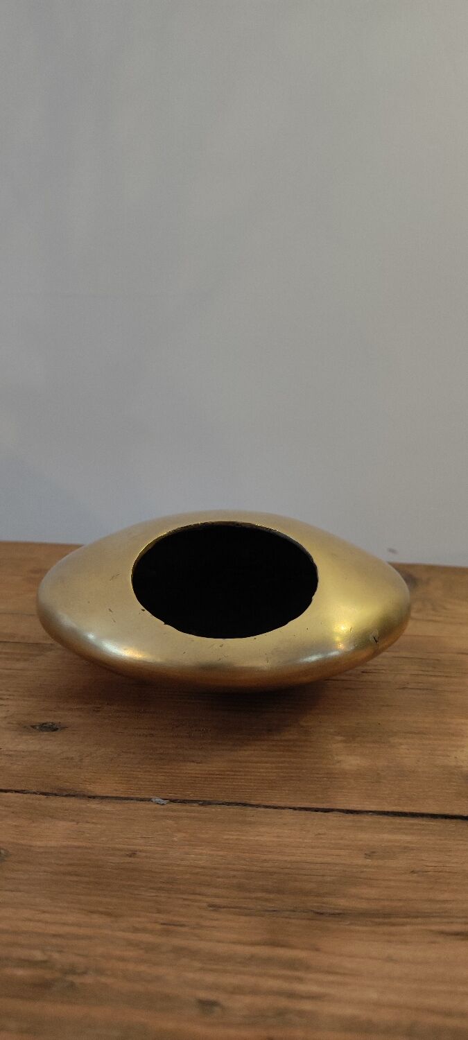 Modernist ashtray pellet in solid bronze.
