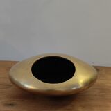 Modernist ashtray pellet in solid bronze.